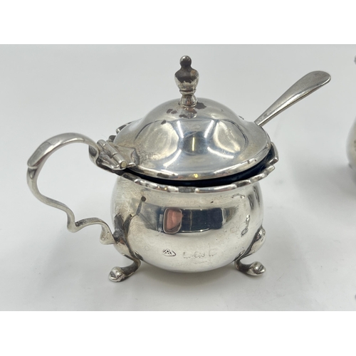 2277 - An Adie Brothers Ltd hallmarked Birmingham silver three piece cruet set, dated 1922 and two .925 sil... 