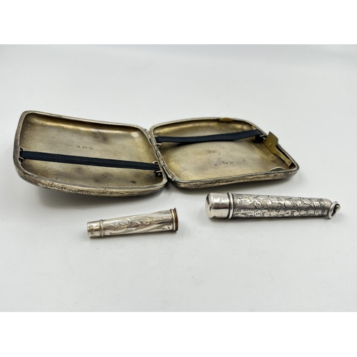 2280 - Three pieces of hallmarked Birmingham silver, two cheroot holders and one George V Constantine & Flo... 