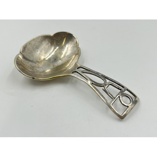 2285 - A Lanson Ltd hallmarked Birmingham silver caddy spoon, dated 1942 - approx. gross weight 21g