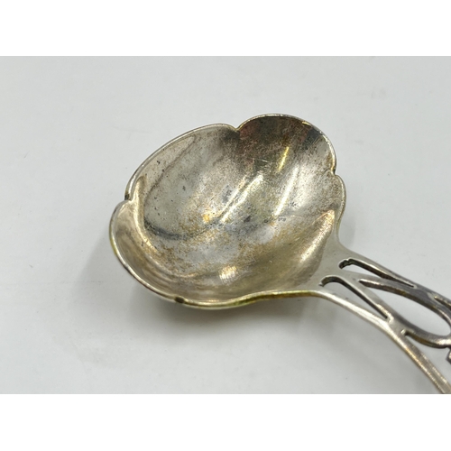 2285 - A Lanson Ltd hallmarked Birmingham silver caddy spoon, dated 1942 - approx. gross weight 21g