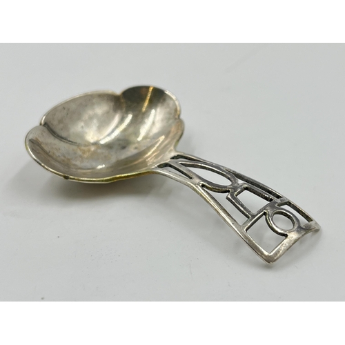 2285 - A Lanson Ltd hallmarked Birmingham silver caddy spoon, dated 1942 - approx. gross weight 21g