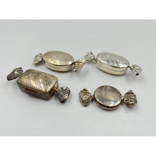 2290 - Four hallmarked sterling silver novelty sweet trinket boxes - approx. gross weight 46g