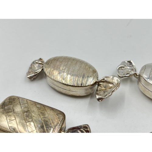 2290 - Four hallmarked sterling silver novelty sweet trinket boxes - approx. gross weight 46g