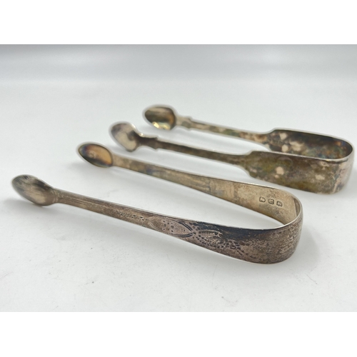 2293 - Two pairs of Georgian hallmarked sterling silver sugar tongs - approx. gross weight 68g