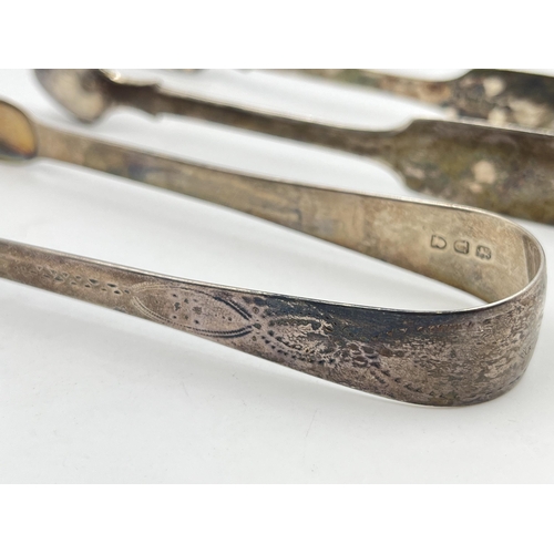 2293 - Two pairs of Georgian hallmarked sterling silver sugar tongs - approx. gross weight 68g