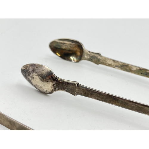 2293 - Two pairs of Georgian hallmarked sterling silver sugar tongs - approx. gross weight 68g