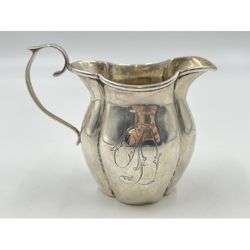 2297 - A George V John Rose hallmarked Birmingham silver cream jug, dated 1911 - approx. gross weight 76g a... 