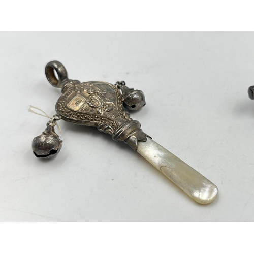 2301 - Two hallmarked sterling silver baby rattles - approx. gross weight 14g