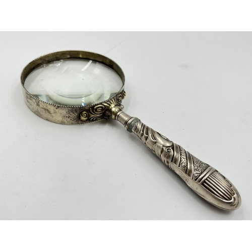 2307 - A silver handled magnifying glass - approx. gross weight 145g and 18cm long