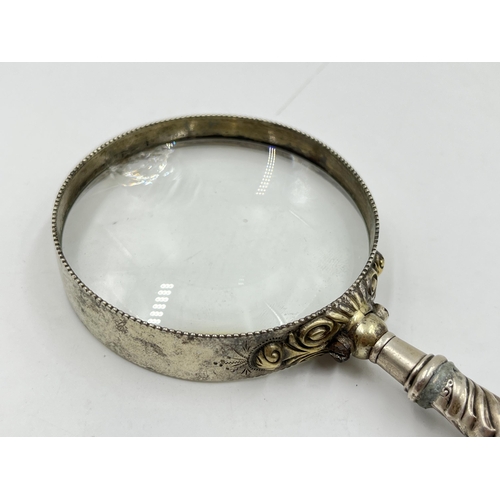 2307 - A silver handled magnifying glass - approx. gross weight 145g and 18cm long