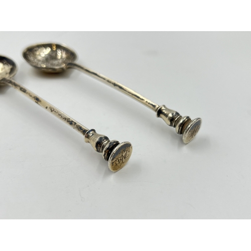 2311 - Two George V Asprey & Co hallmarked London silver spoons, dated 1932 - approx. gross weight 50g and ... 