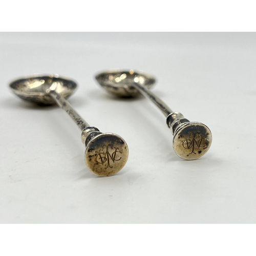 2311 - Two George V Asprey & Co hallmarked London silver spoons, dated 1932 - approx. gross weight 50g and ... 