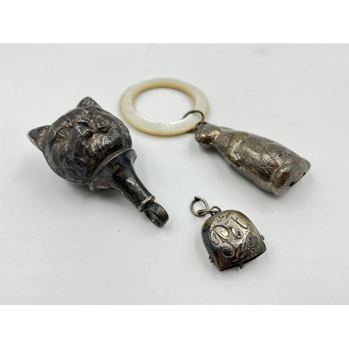 2317 - Three hallmarked sterling silver items, two rattles and one pet bell tag - approx. gross weight 44g