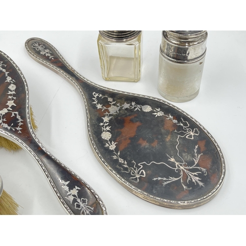 2336 - Six hallmarked sterling silver and tortoiseshell items to include Charles & Richard Comyns four piec... 