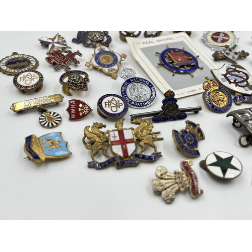 2351 - A collection of base metal and enamel pin badges to include British Legion, Civil Defence Corps etc.