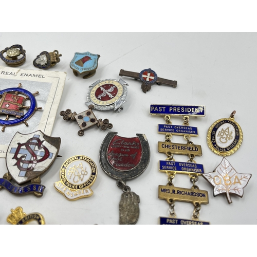 2351 - A collection of base metal and enamel pin badges to include British Legion, Civil Defence Corps etc.