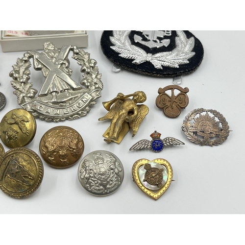 2352 - A collection of medals, buttons, cap and pin badges to include RAF, Royal Navy, 1939-1945 War medal,... 