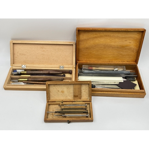 2354A - Three wooden boxes containing tools to include Wilson glass cutters, Swann-Morton stainless steel sc... 