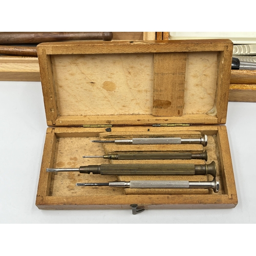 2354A - Three wooden boxes containing tools to include Wilson glass cutters, Swann-Morton stainless steel sc... 