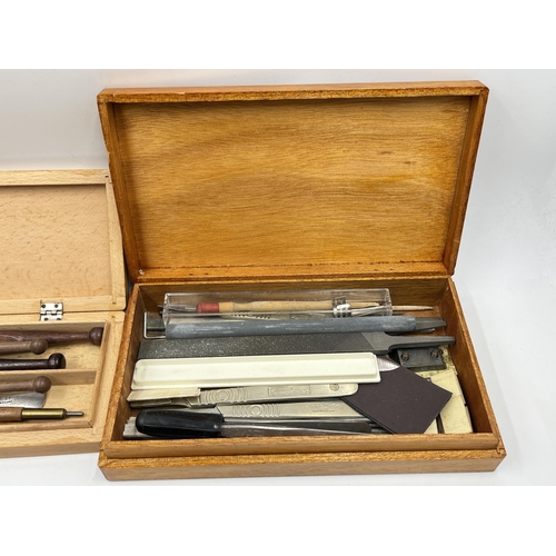 2354A - Three wooden boxes containing tools to include Wilson glass cutters, Swann-Morton stainless steel sc... 