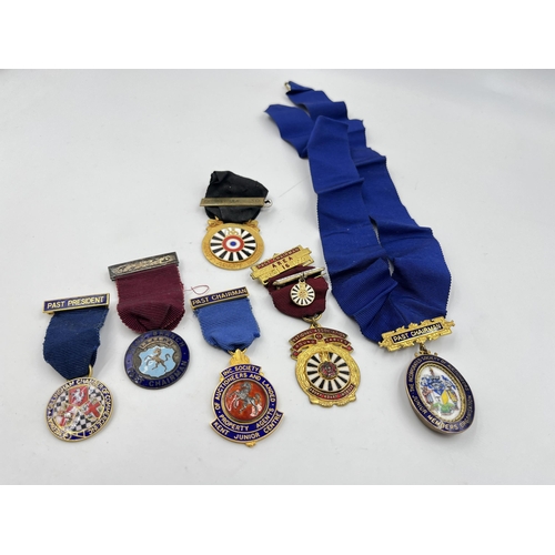 2363 - Six mid 20th century base metal and enamel medals