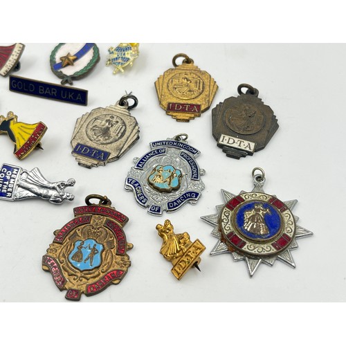 2366 - A collection of vintage medals and badges to include Alliance of Professional Teachers of Dancing et... 