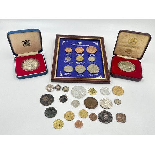 2380 - A collection of coins and tokens to include 92.5% silver proof 1977 Silver Jubilee twenty-five pence... 