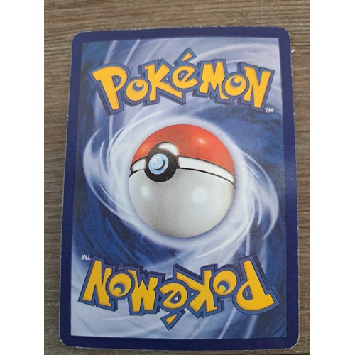 393 - A collection of 1990s Pokémon cards to include Blaine's Charizard, Blaine's Mankey, Brock's Zubat et... 