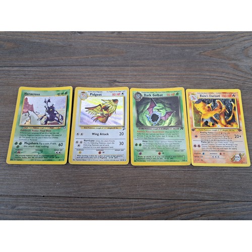 393 - A collection of 1990s Pokémon cards to include Blaine's Charizard, Blaine's Mankey, Brock's Zubat et... 