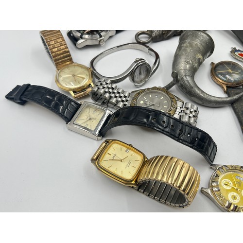 2385 - A collection of items to include mid 20th century Timex mechanical wristwatch, mid 20th century Inge... 