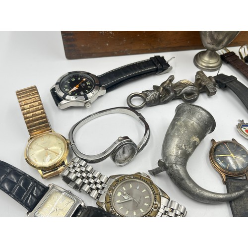 2385 - A collection of items to include mid 20th century Timex mechanical wristwatch, mid 20th century Inge... 