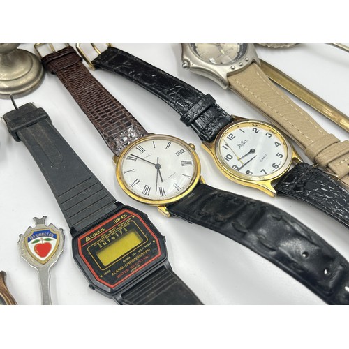 2385 - A collection of items to include mid 20th century Timex mechanical wristwatch, mid 20th century Inge... 