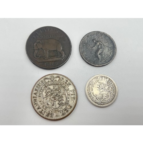 2372 - Four George III coins, one 92.5% silver 1816 shilling, one 1815 Ceylon two stivers, one believed pat... 