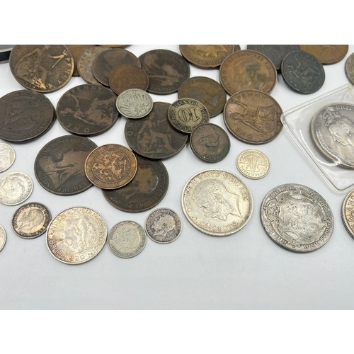 2368 - A collection of coins with silver examples to include 92.5% 1890 and 1892 crowns, 92.5% 1917 half cr... 