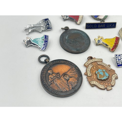 2366 - A collection of vintage medals and badges to include Alliance of Professional Teachers of Dancing et... 