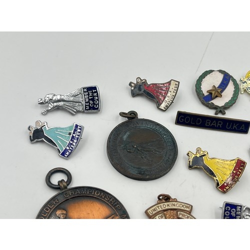 2366 - A collection of vintage medals and badges to include Alliance of Professional Teachers of Dancing et... 