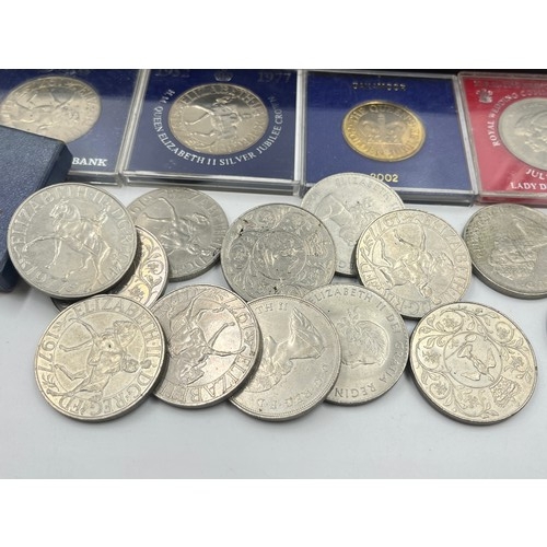 2382 - A collection of British commemorative coins with £5 examples to include 1997, 1998, 1999, four 2000,... 