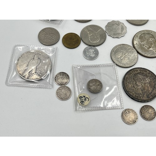 2384 - A collection of tokens, medals and coins with silver examples to include 75% Polish 5 Złotych, two 5... 