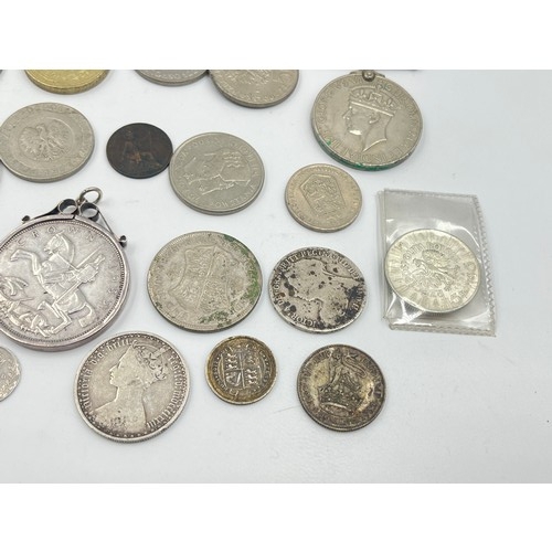 2384 - A collection of tokens, medals and coins with silver examples to include 75% Polish 5 Złotych, two 5... 