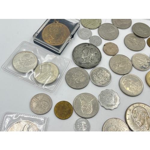 2384 - A collection of tokens, medals and coins with silver examples to include 75% Polish 5 Złotych, two 5... 