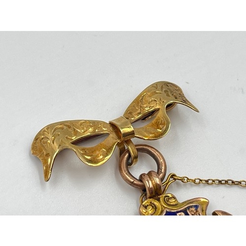 2386 - An early 20th century hallmarked 9ct gold fob with mounted 9ct gold ribbon brooch - approx. gross we... 