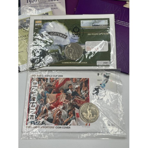 2379 - A collection of packaged coins and banknotes to include 2004, 2005, 2006 £5 first day coin covers, 9... 