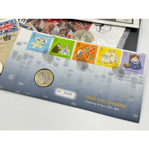 2379 - A collection of packaged coins and banknotes to include 2004, 2005, 2006 £5 first day coin covers, 9... 