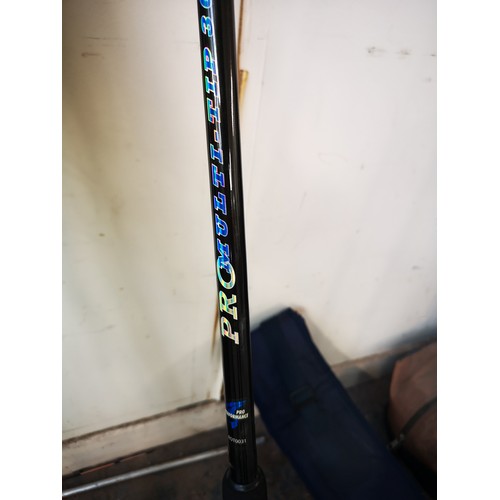 A collection of fishing rods and nets to include Shakespeare carp rods ...