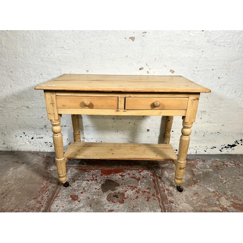 80 - A Victorian pine two drawer wash stand/console table - approx. 73cm high x 95cm wide x 52cm deep