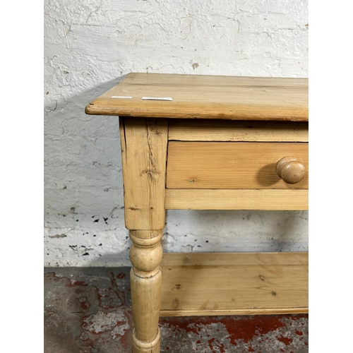 80 - A Victorian pine two drawer wash stand/console table - approx. 73cm high x 95cm wide x 52cm deep