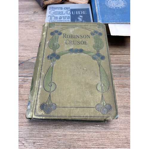 490 - A collection of antique and later books to include Scott's Poetical works circa 1887, Robinson Cruso... 