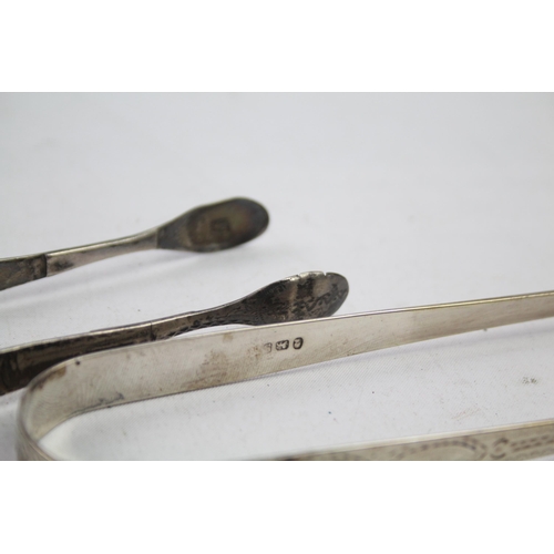 2154 - Two pairs of antique hallmarked sterling silver sugar tongs - approx. gross weight 63g