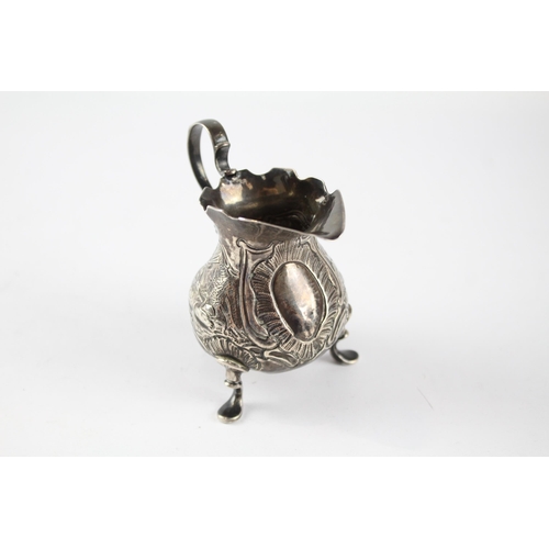 2158 - A Georgian hallmarked London sterling silver cream jug, dated 1744 - approx. gross weight 76g and 8.... 