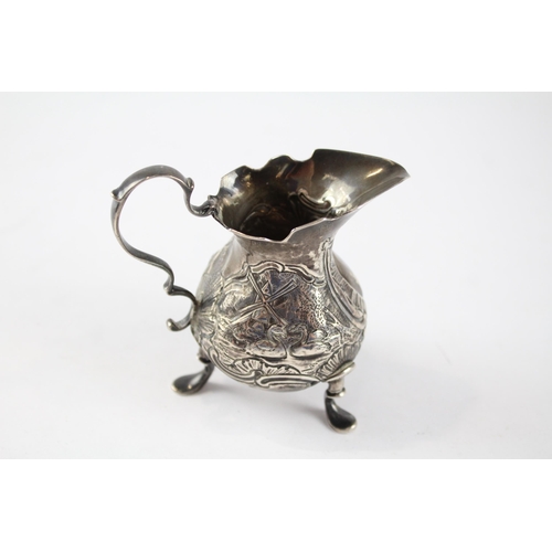 2158 - A Georgian hallmarked London sterling silver cream jug, dated 1744 - approx. gross weight 76g and 8.... 